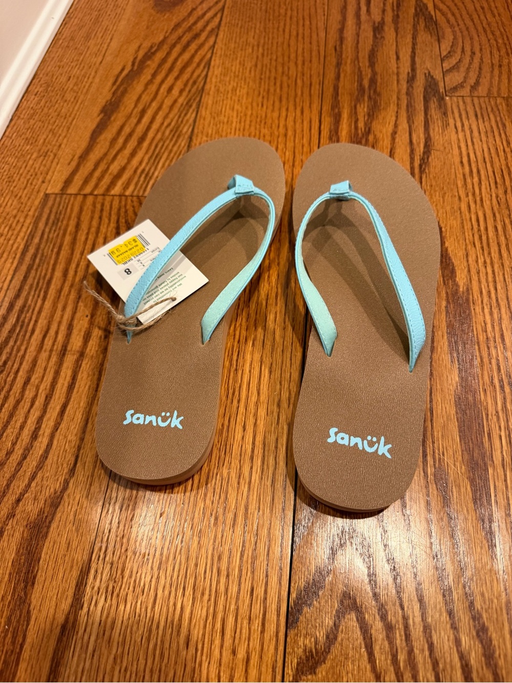 Sanuk Women's Brown Flip Flop Sandals with Light Blue Straps